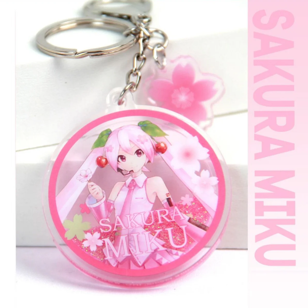 Officially Licensed Sakura Miku Pink Liquid Sand Acrylic Charm - Image 2